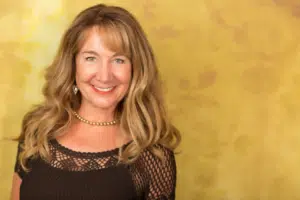 Cindy on a gold background